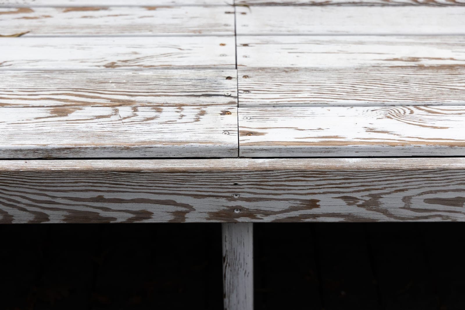 Outdoor furniture on a deck after rain